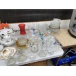 AN ASSORTMENT OF GLASS WARE TO INCLUDE TRIFLE BOWLS, CHAMPAGNE FLUTES AND BRANDY GLASSES ETC