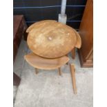 A RETRO TEAK SET OF FOUR TABLES (MAIN TABLE 24" DIAMETER) A/F