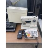 A PFAFF 1222E SEWING MACHINE WITH CARRY CASE AND MANUAL