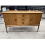 A RETRO TEAK SIDEBOARD BY RUSSELL OF BROADWAY, 55" WIDE