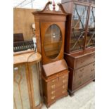 A REPRODUCTION YEW WOOD BUREAU BOOKCASE WITH OVAL GLASS DOOR TO THE UPPER PORTION, SWAN NECK