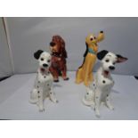 FOUR CERAMIC DISNEY CHARACTER DOGS