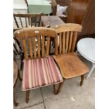 A PAIR OF VICTORIAN ELM AND BEECH KITCHEN CHAIRS