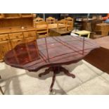 AN ITALIAN STYLE DINING TABLE ON QUARTETTO BASE, 69X43"