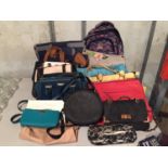 A LARGE SELECTION OF BAGS TO INCLUDE BACKPACKS, HANDBAGS AND TOTES