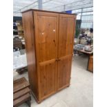 A MODERN PINE TWO DOOR WARDROBE, 40" WIDE