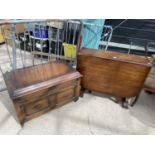 A MID 20TH CENTURY DROP-LEAF DINING TABLE AND A BLANKET CHEST