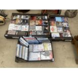 A LARGE ASSORTMENT OF DVDS AND CDS ETC