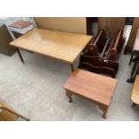 AN OAK COFFEE TABLE, LOW STOOL AND THREE VARIOUS MAGAZINE RACKS