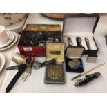 TWO BOXES OF VARIOUS WATCHES, A GOLF MEDAL AND A 4TH ANNIVERSARY COIN OF THE BATTLE OF EL ALAMEIN