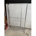 A STAINLESS STEEL TWO TIER CLOTHES RAIL
