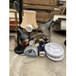 AN ASSORTMENT OF TABLE LAMPS, RADIO AND CLOCKS ETC