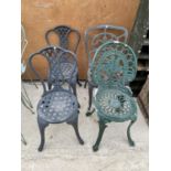 A GROUP OF FOUR VARIOUS CAST ALLOY BISTRO CHAIRS