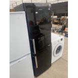 A BLACK SAMSUNG UPRIGHT FRIDGE FREEZER BELIEVED IN WORKING ORDER BUT NO WARRANTY