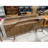 A 1970'S WALNUT EFFECT DRESSING TABLE