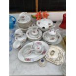 AN ASSORTMENT OF FLORAL DESIGN CERAMIC WARE DINNER SERVICE