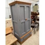 A MODERN PAINTED PINE TWO DOOR WARDROBE WITH DRAWER TO THE BASE, 37.5" WIDE