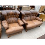 A TWO SEATER SETTEE AND EASY CHAIR BY WORLD OF LEATHER