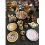 A LARGE ASSORTMENT OF STUDIO POTTERY TO INCLUDE JUGS, VASES AND PLATES