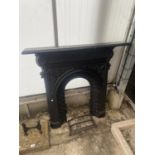 A VINTAGE CAST IRON FIRE SURROUND WITH FIRE FRONT