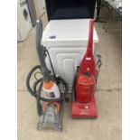 A VAX RAPIDE CARPET CLEANER AND A FURTHER HOOVER VACUUM CLEANER