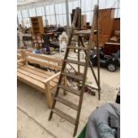 A VINTAGE SIX RUNG WOODEN STEP LADDER