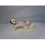 A ROYAL DOULTON DISNEYS 101 DALMATIONS FIGURE 'LUCKY AND FRECKLES ON ICE'