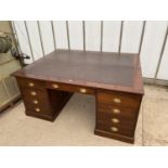 A MID 20TH CENTURY PARTNERS DESK ENCLOSING EIGHTEEN DRAWERS WITH SCOOP HANDLES, FOUR SLIDES, 66X53.