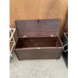 A VINTAGE WOODEN STORAGE CHEST