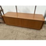 A RETRO TEAK G-PLAN LOW UNIT WITH SLIDING DOORS, 60" WIDE