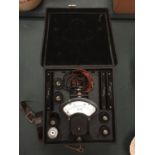 AN ELECTRIC TESTER IN A BOX WITH KEY