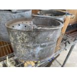 A GROUP OF THREE GALVANISED MOP BUCKETS