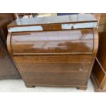 A 19TH CENTURY STYLE MAHOGANY CYLINDER BUREAU, 41" WIDE, HAVING PULL-OUT SLIDE, INLAID FITTED