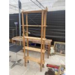 A FIVE TIER WOODEN SHELVING UNIT