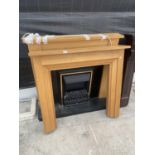 A WOODEN SURROUND ELECTRIC FIRE AND A FURTHER WOODEN FIRE SURROUND