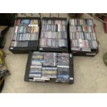 A LARGE QUANTITY OF DVDS AND CDS