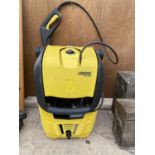 A KARCHER KB 4040 PRESSURE WASHER WITH NOZZLES AND ATTACHMENTS. BELIEVED IN WORKING ORDER BUT NO