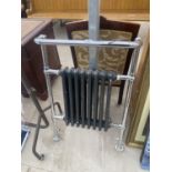 A CHROME RADIATOR TOWEL RAIL