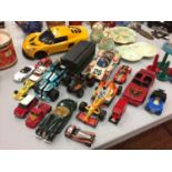 AN ASSORTMENT OF TOY CARS
