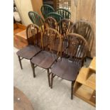 A SET OF SIX WHEELBACK KITCHEN CHAIRS