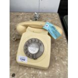 A VINTAGE CREAM TELEPHONE