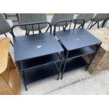 A PAIR OF BLACK PAINTED METALWARE BEDSIDE TABLES