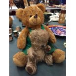 A JOHN DEERE TEDDY BEAR AND A VINTAGE JOINTED TEDDY BEAR