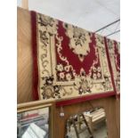 A RED AND IVORY PATTERNED MARAKESH RUG (170 X 120)