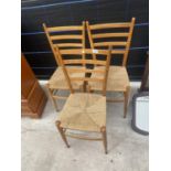 A SET OF THREE RETRO BEECH RATTAN SEATED CHAIRS WITH LADDERBACKS