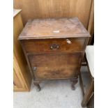 A WALNUT BEDSIDE CABINET, ON CABRIOLE LEGS