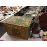 A BRASS DECORATIVE COAL BOX AND A STYLISH OIL LAMP ON STAND