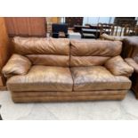 A MODERN LEATHER THREE SEATER SETTEE