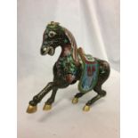 A CHINESE BRONZE CLOISONNE ENAMEL AND GILT HORSE