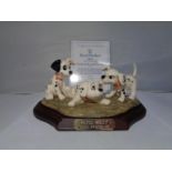 A ROYAL DOULTON DISNEYS 101 DALMATIANS 'PATCH, ROLLY AND FRECKLES'